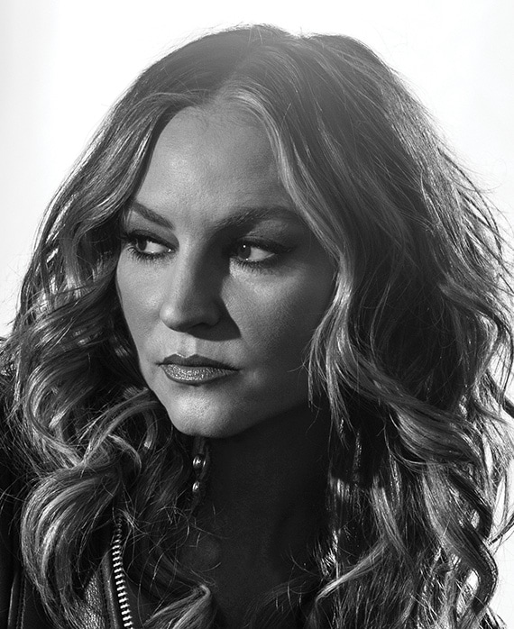 Drea DeMatteo headshot turning her head to the side