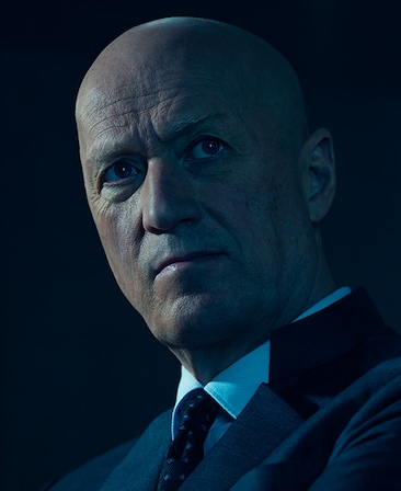 Headshot of Adrian Edmondson as Atom Eins