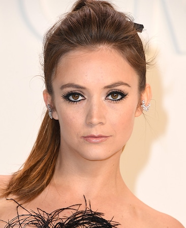Billie Lourd headshot wearing a feathered top for AHS: 13