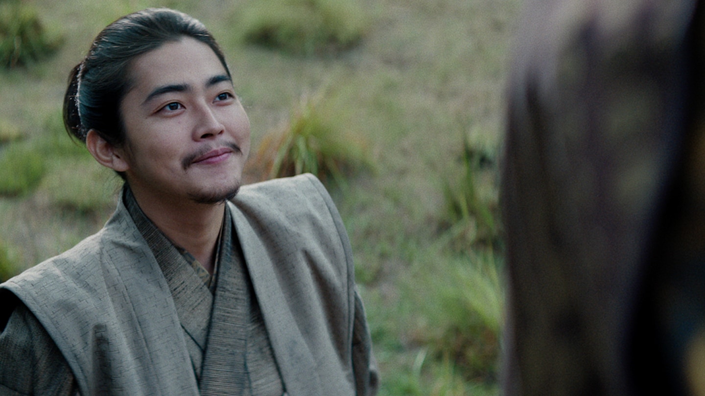 Close up of Nagakado smiling up at his father Lord Toranaga 