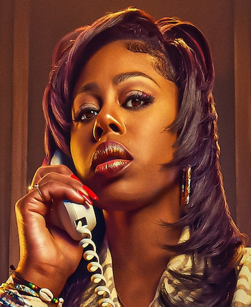 Gail Bean as Wanda Bell in FX's The Drop, holding a wired phone and bright red nails.