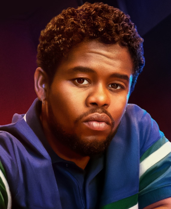 Isaiah John as Leon Simmons in FX's The Drop wearing a blue shite with white and green stripes.