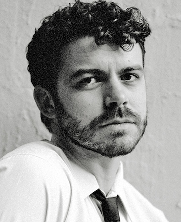 Joey Pollari headshot wearing a white button up shirt and black tie for AHS: 13
