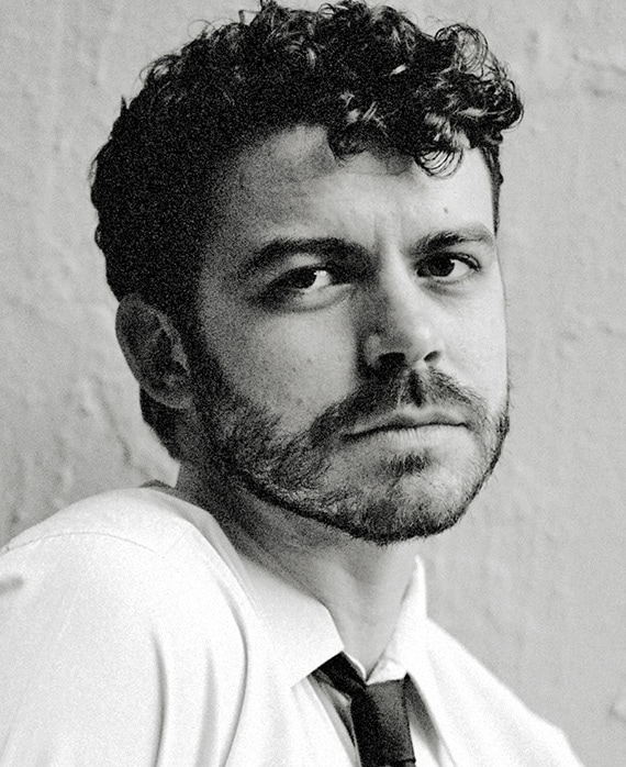 Joey Pollari headshot wearing a white button up shirt and black tie for AHS: 13