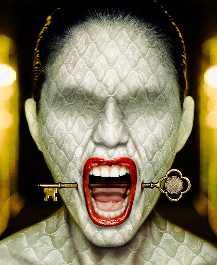 Woman with mattress texture skin with hotel key through mouth from FX's AHS Hotel
