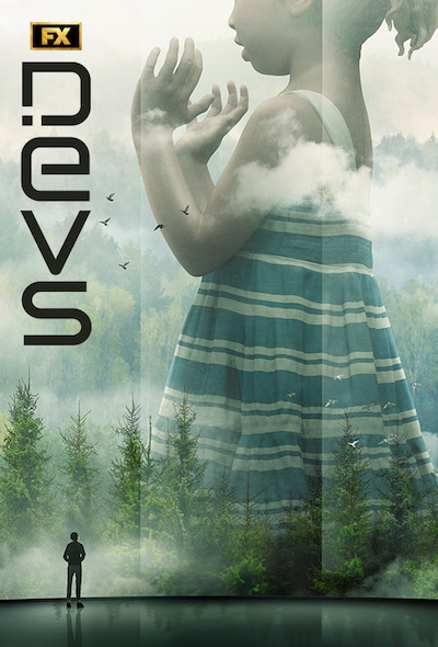 Man staring at a screen with a statue emerging from the forest for FX's Devs