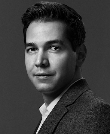 Tanase Popa headshot wearing a suit