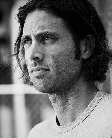 Brad Falchuk headshot wearing a grey shirt